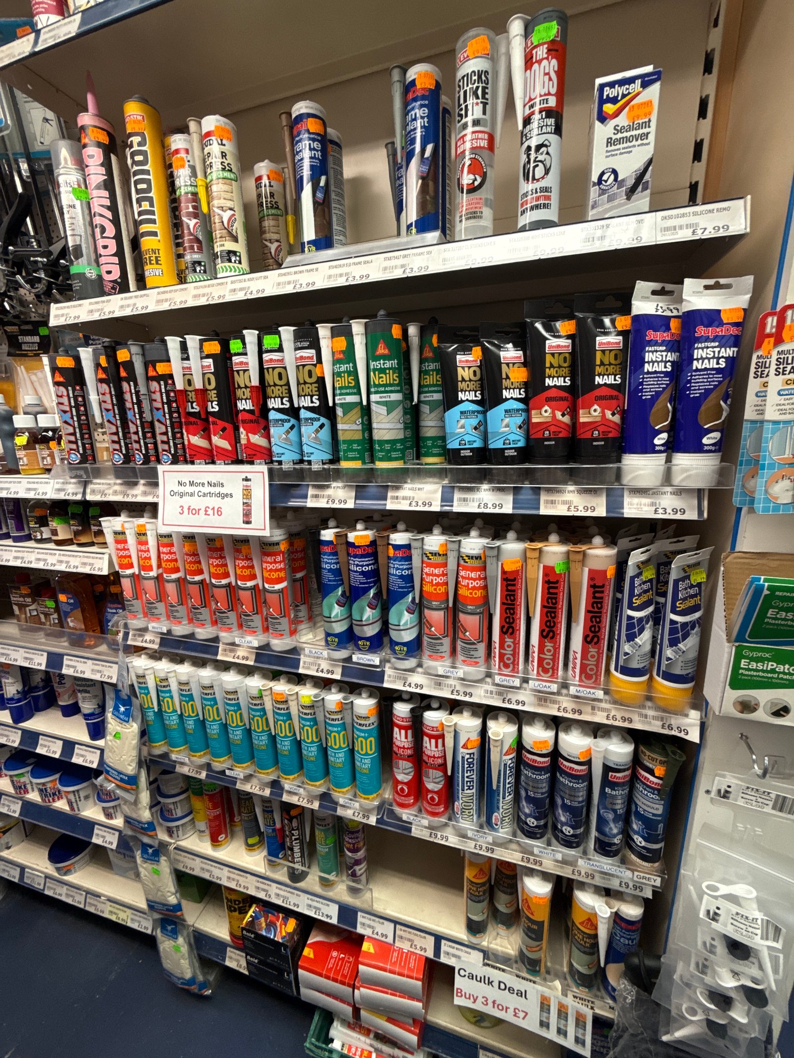 Decorating on the shelves at Fix-it DIY & Hardware